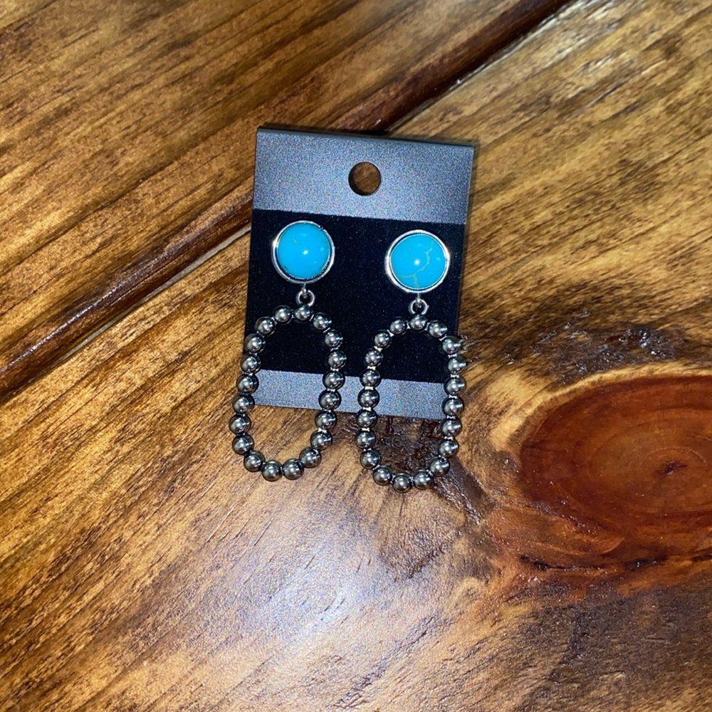 Sterling silver and turquoise dangling earrings